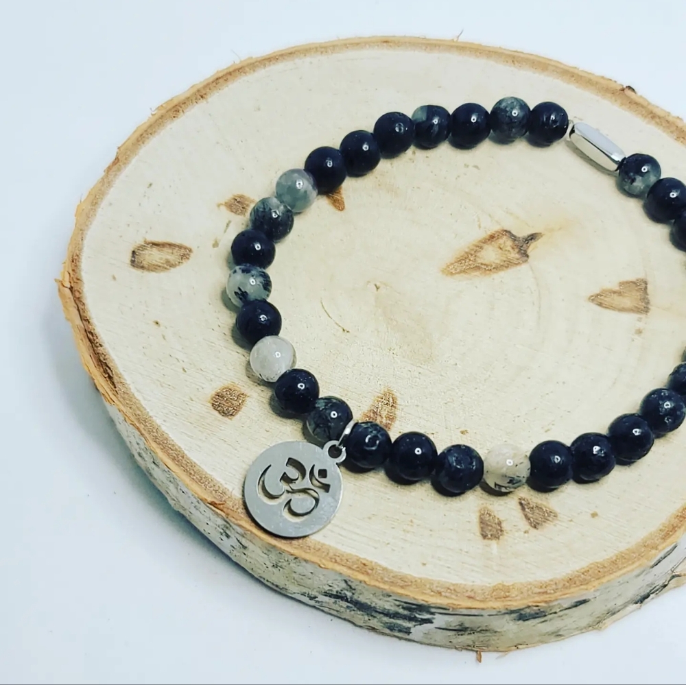 Rutilated Quartz Om charm bracelet 6 mm